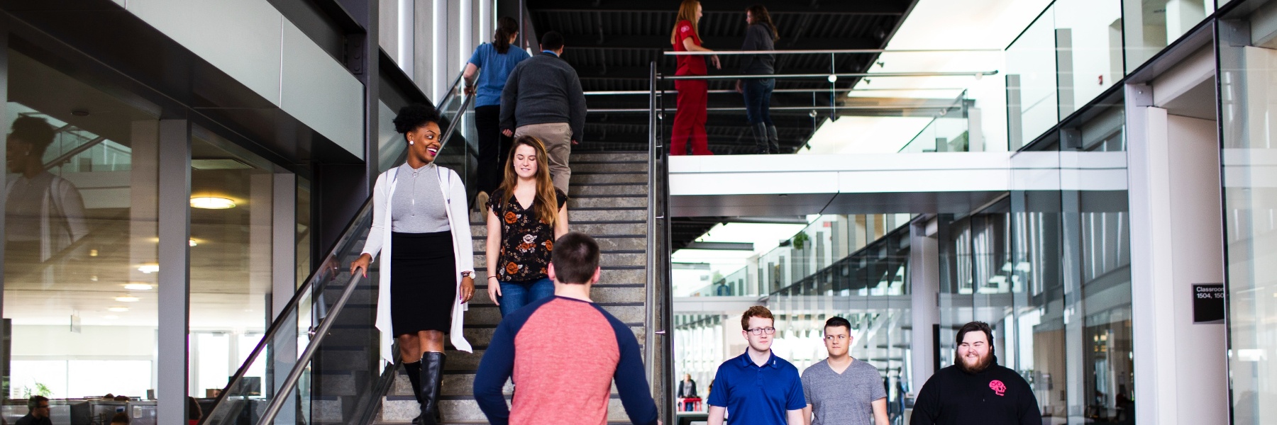 Photo of students on the stairwell at the CLC.