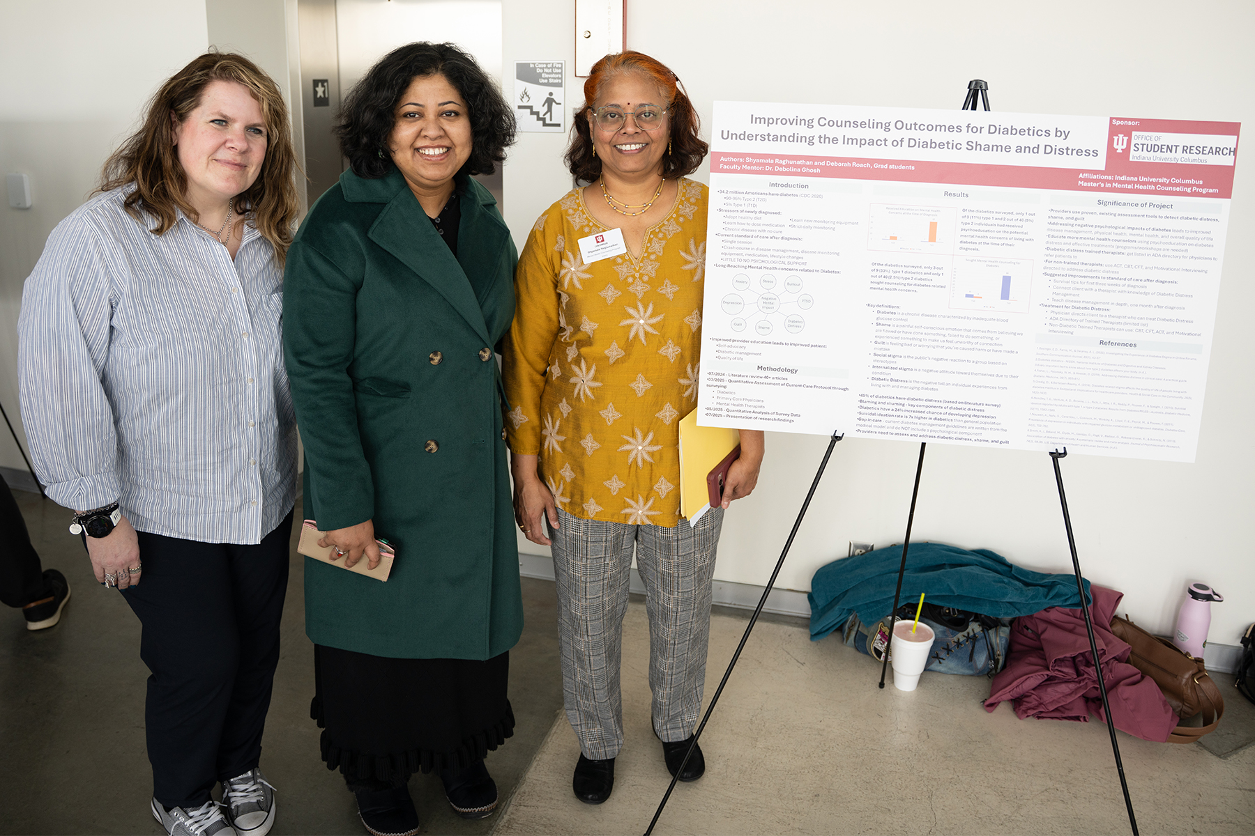 Shyamala, Deborah and Debolina at the 2025 OSR Exhibition